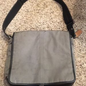 Coach messenger bag used as a diaper bag